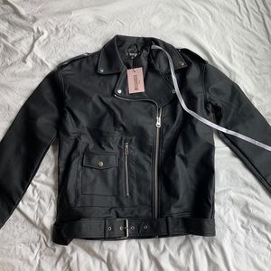 Black leather jacket with buckle detailing